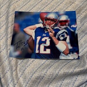 - Tom Brady Autographed New England Patriots 8 x 10 photo